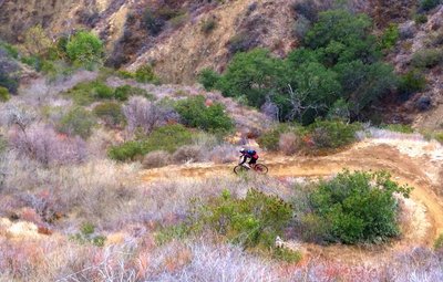 Like a sled course, The Luge snakes steeply down the cliff side.