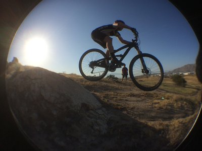 Air time off a rock drop. This place is like a natural rock bike park.