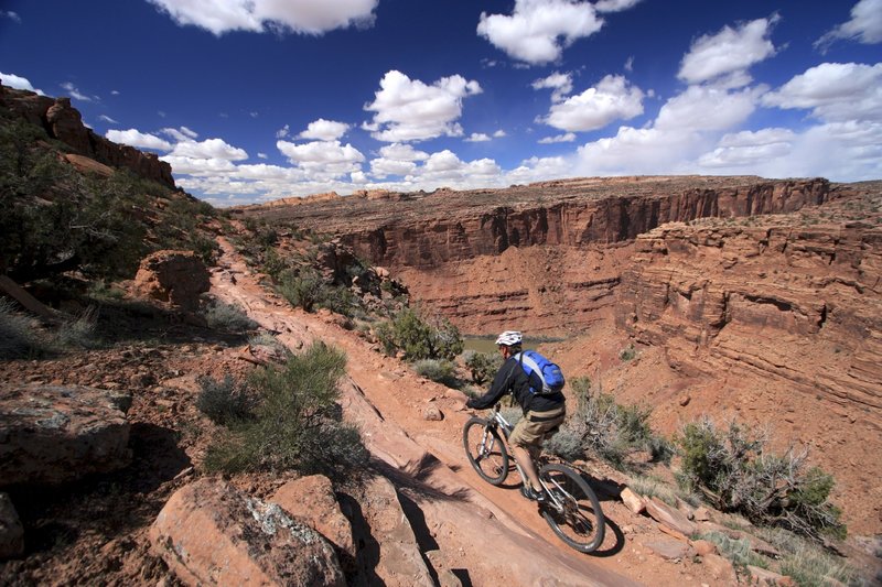 Hitting the Porcupine Rim singletrack high above the Colorado River.