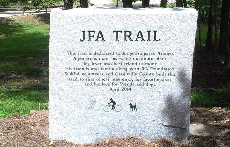 Trail dedication marker.