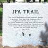 Trail dedication marker.