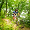 Cruising through hardwood forest along the lake shore.