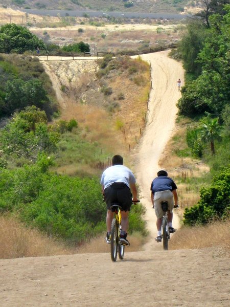 To keep your spirits high, try not to look at "Thrash Mountain" in the distance, a short but steep rutted hill on the way to the dam.