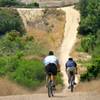 To keep your spirits high, try not to look at "Thrash Mountain" in the distance, a short but steep rutted hill on the way to the dam.