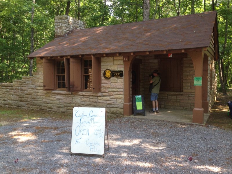 CCC Museum at DeSoto State Park, at entrance road and intersection of Knotty Pine Trail and Dragon's Tail Trail.