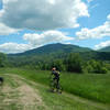 Heading back to the Burke Bike Barn after finishing the loop. View of Burke Mtn.