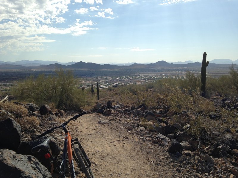 Getting ready to head downhill. The mountain in the distance are a part of the Sonoran Figure 8