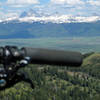 View from the top looking at the Teton Range.  Trail will hit the ridge that is on the right off the handlebar.