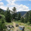 Trail looking West, I-70 can be seen in the upper right of the photos