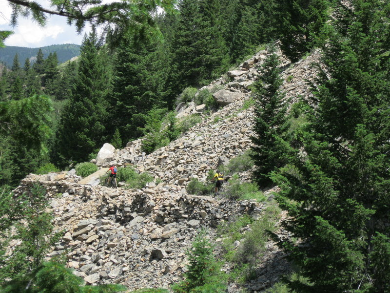 The large slab in the picture pinches the trail to about 18" so you may want to walk your bike at this point.