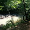 Small waterfall of Steele Creek along side the trail of Anne Springs Close Greenway