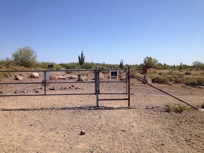 Gate at the south entrance to Desert Foothills Land Trust preserve. Turn right after the gate and follow Town of Cave Creek Trail signss.