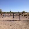 Gate at the south entrance to Desert Foothills Land Trust preserve. Turn right after the gate and follow Town of Cave Creek Trail signss.