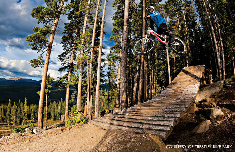 The final wood-to-dirt drop on Trestle Downhill!