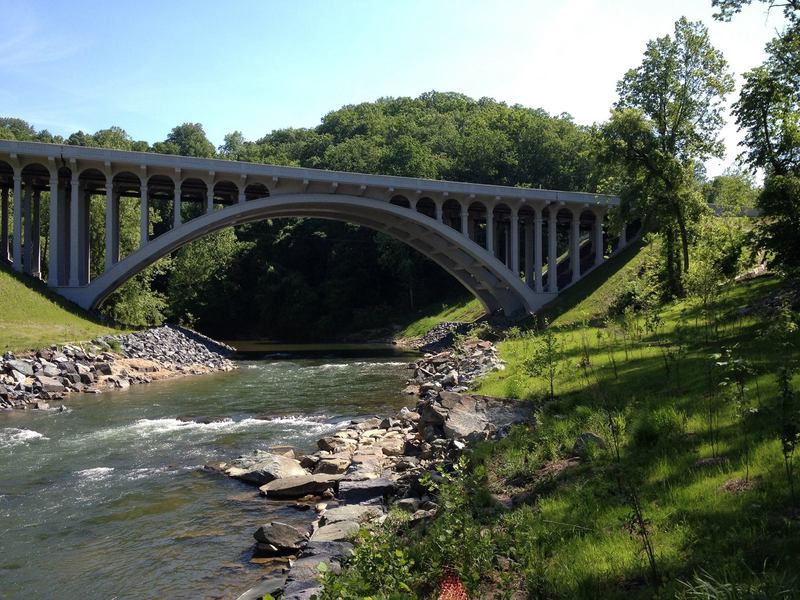 Under the Route 40 bridge.