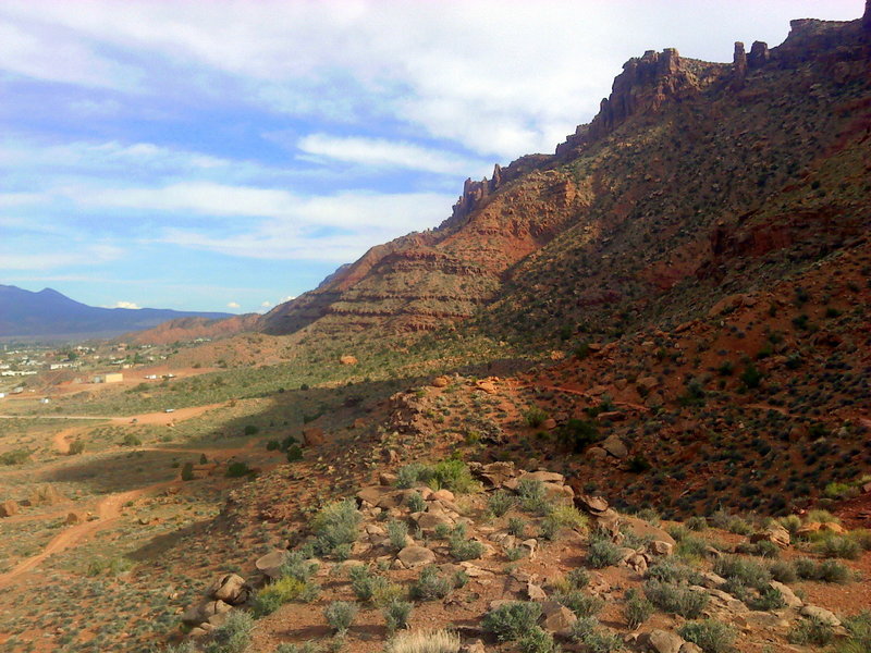 Evening shade from the Moab Rim helps make Pipe Dream a perfect after-work trail on hot days.