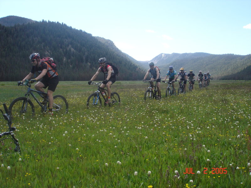 Riding across Warm Springs Meadow.