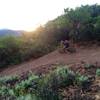 Sunset and swooping berm on the Deadline Trail.