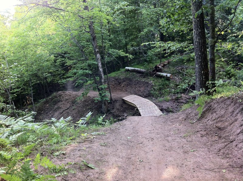 A boardwalk with a steeper angle descent.