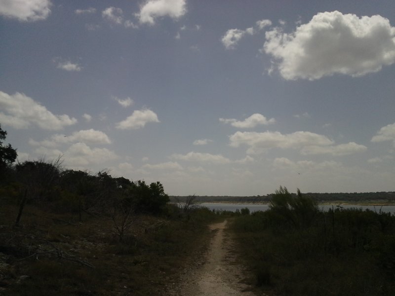 Looking southeast towards Lake Georgetown, nearing the end of the doubletrack section between the Tejas Campground and Russell Park