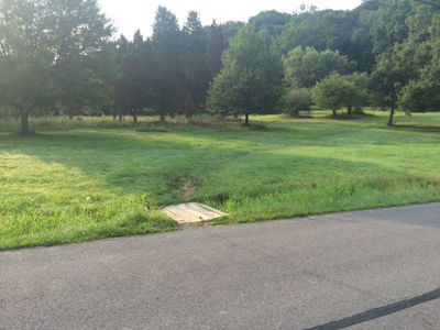 Entrance to trail on access road