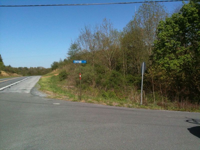 Google Maps has the name of the road wrong, its State Park Road. A little sign and no mention of the trails, so keep a sharp eye out.