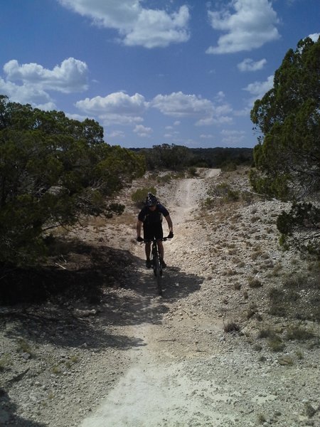 Riding the rollers of the Fence Line Trail