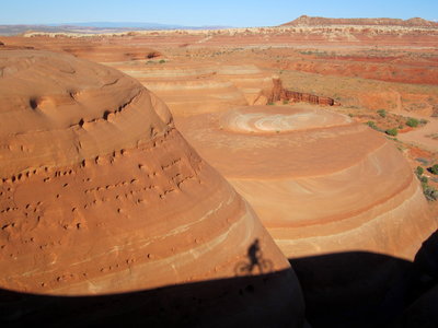 Shadows on slickrock in the evening light.