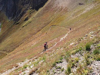 Riders descending from Sharkstooth Pass toward Bear Creek Drainage.