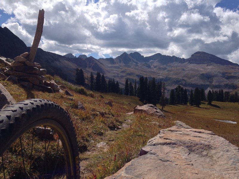 Looking back down Sharkstooth Trail toward Centennial Peak. High-alpine views are nothing short of spectacular!