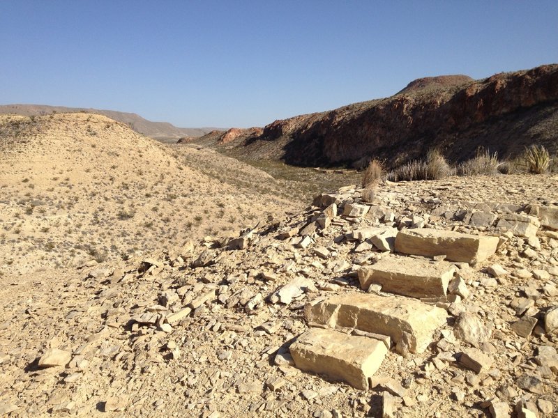 Ruins with waterhole in background