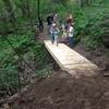 One of many well-built and safe bridges that cross watershed ravines that grow with each passing year.