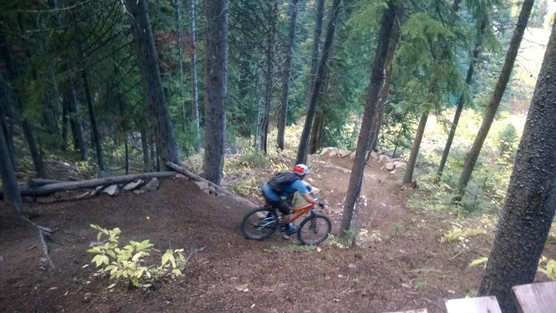 Riding the steeper switchbacks of Psycho Rocks