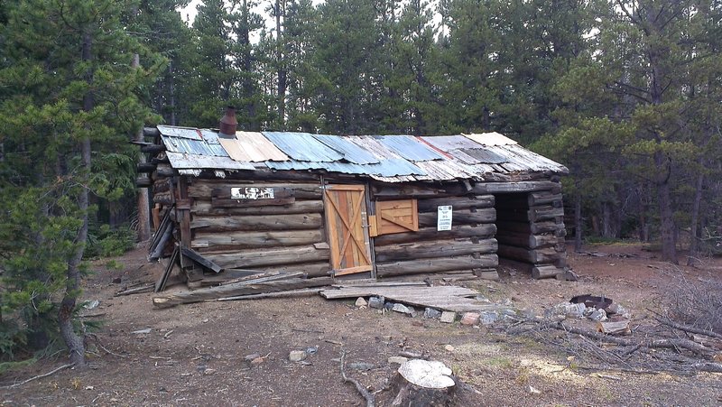 The One Step Over cabin just uphill from Golden Gate Loop (GH 39) and Prospect Hill Road (GH 38) intersection.