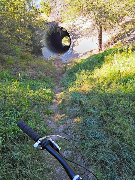 The culvert tunnel under "South 14" is well-lit and easily rideable but does include a large rock part way through