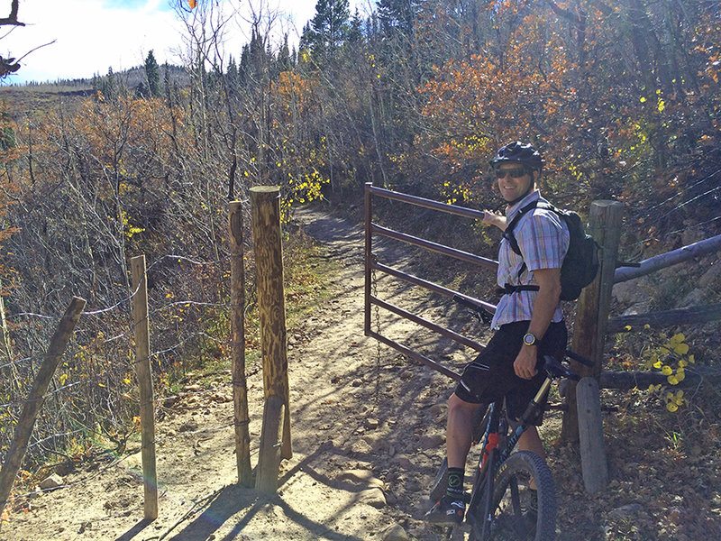 The loose rocks and babyheads on the climb are done when you hit this gate.