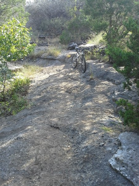 The granite rock bermed curve just before Mile Marker 4