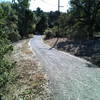 Wide open trail by a small lake. On Arastradero