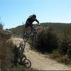 Racing down Meadows Trail on the first downhill stretch on the route