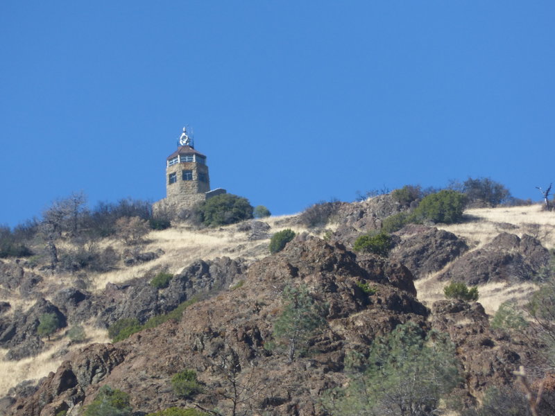 The summit building and signal light from Rhine Canyon Rd