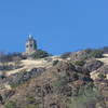 The summit building and signal light from Rhine Canyon Rd