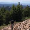 Traversing a rockslide on the Cougar Peak ascent.