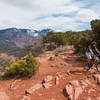 Trail junction of LPS and Porcupine Rim, with an overlook to the La Sals and Castle Valley.