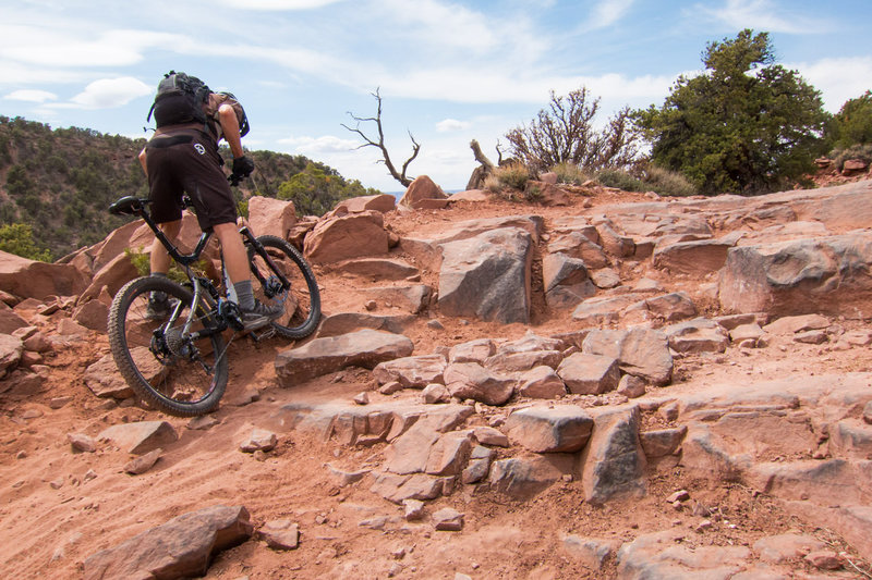 The trail is pretty chunky and loose on the final section of the climb.