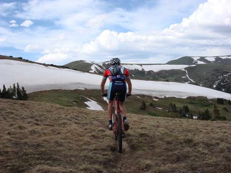 Just before you top out at Georgia Pass, stop, regroup, refuel, laugh with friends and enjoy the scenery. For a better way back down go right on W. Jefferson trail instead of going back down the way you came.