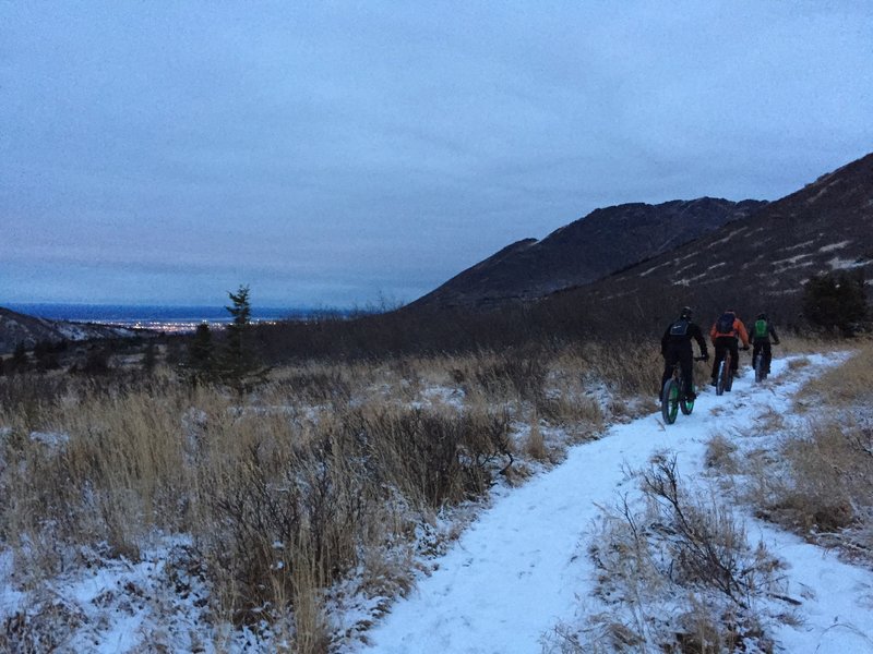 Heading down Middle Fork Trail with Anchorage lights in the distance