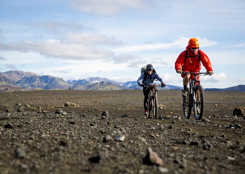 Crossing through a large valley across volcanic soils on the Laugavegur Route.