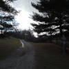 Gravel road with "No Boating Allowed" sign.  Marking the way to the singletrack.