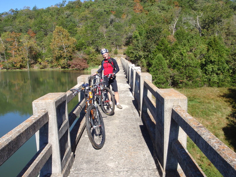 Riding over the dam to the west side of the lake.