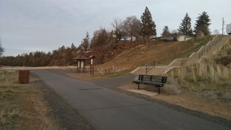 The trail begins right after the first set of stairs by the disc golf park.